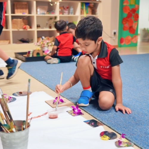 Students engaged in arts, music, drama and painting